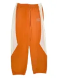 Sinclair Tech Logo panelled track pants - Orange