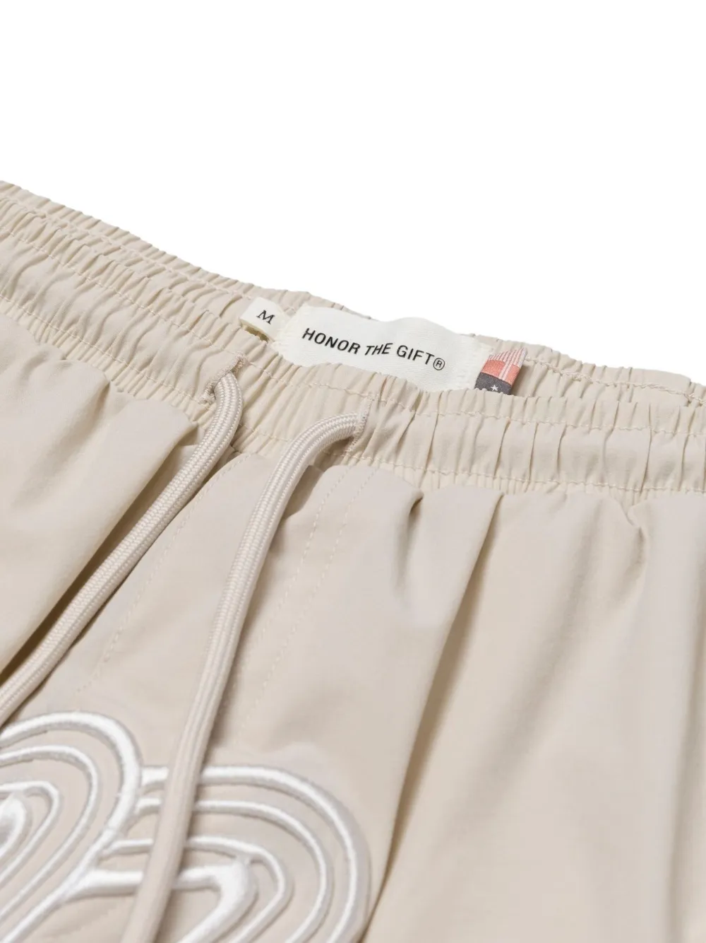 Honor The Gift Trainingsshorts met geborduurd logo Beige