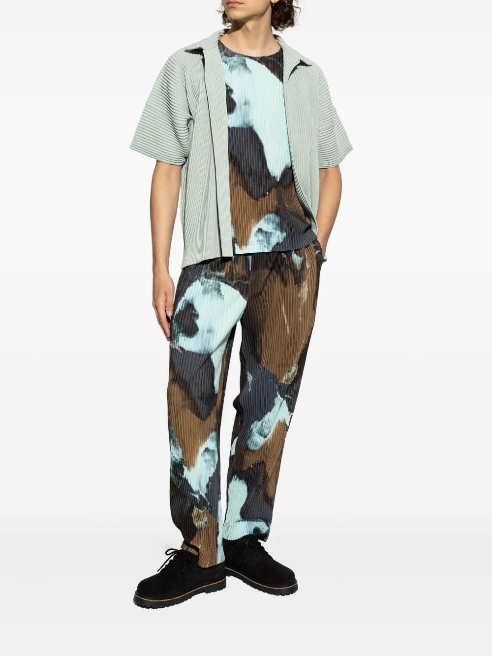 Homme Plissé Issey Miyake pleated abstract-print trousers - Bruin