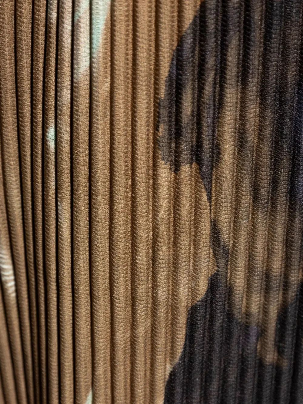 Issey Miyake Pleated Abstract-print Trousers In Brown