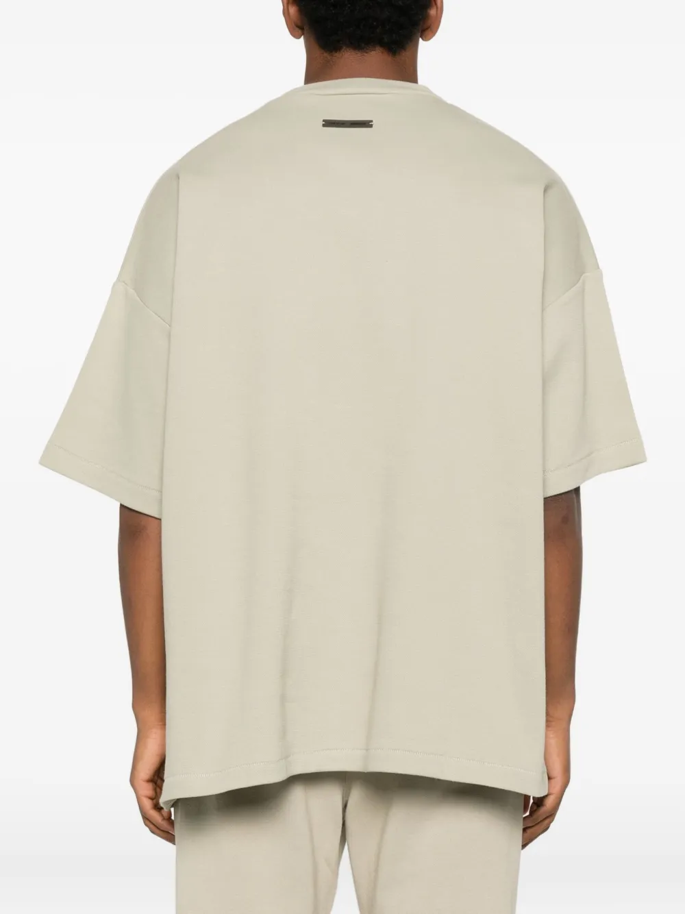 FEAR OF GOD ESSENTIALS T-shirt met logopatch Beige