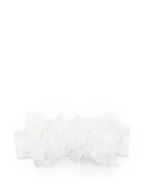 La Stupenderia diadema con aplique floral