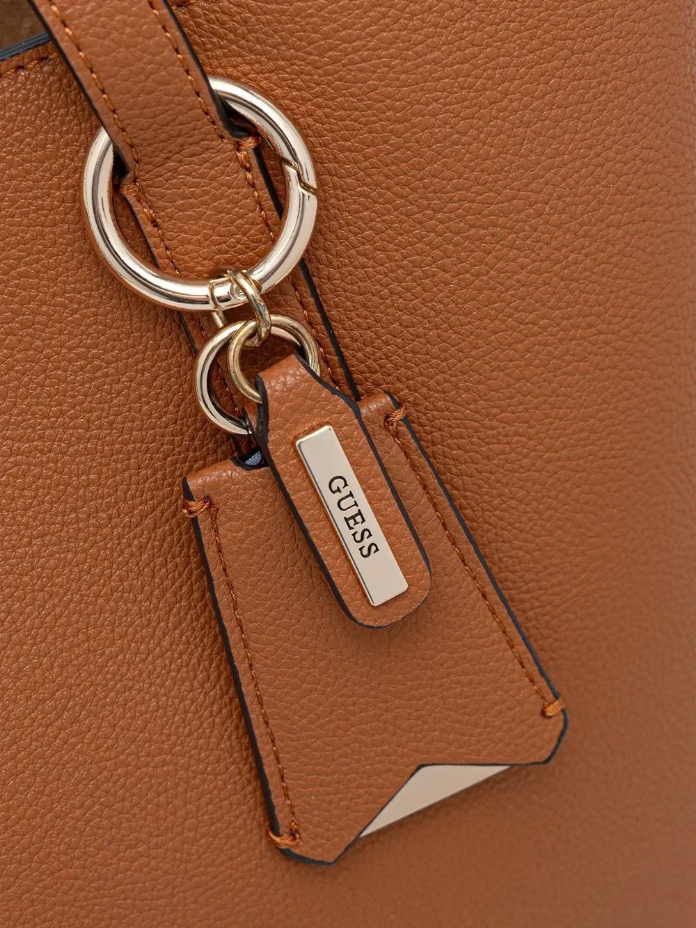 Guess Usa Triangle-logo Charm Shoulder Bag In Brown