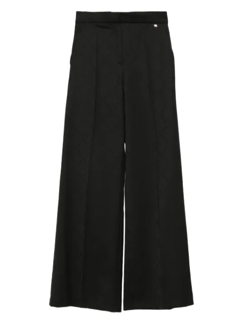 NISSA pressed-pleat geometric-pattern trousers