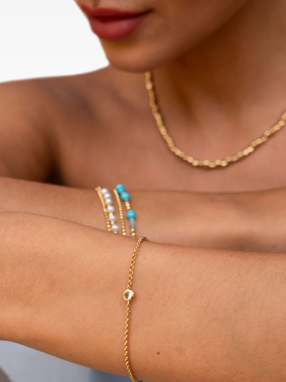 DOWER AND HALL Schakelarmband met enkele aquamarijn - Goud