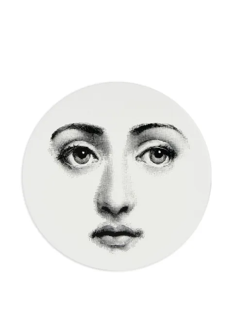 Fornasetti face-print tripod coffee table