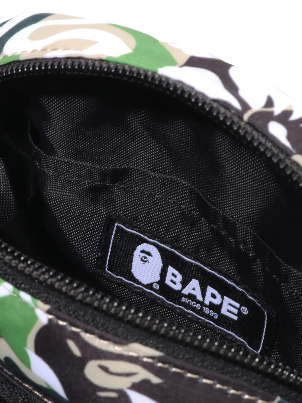 A BATHING APE Messengertas met hibiscusprint en camouflageprint Groen