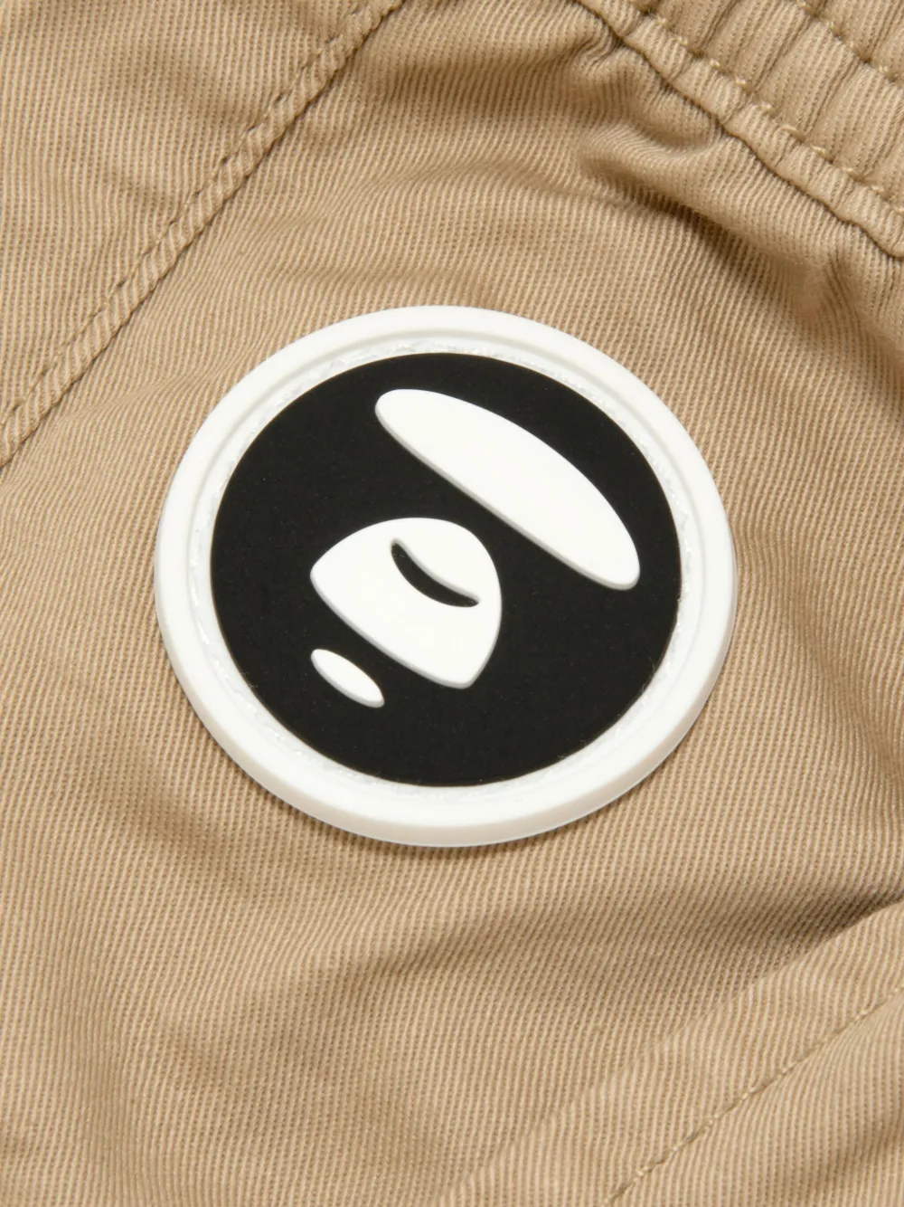 AAPE BY *A BATHING APE head logo-plaque regular trousers Bruin