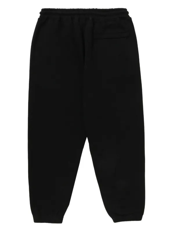 A Bathing Ape ブラック トラックパンツ M A BATHING APE® シャークヘッド トラックパンツ | ブラック | FARFETCH JP
