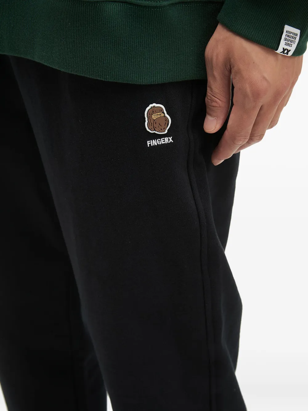 Fingercroxx Logo-patch Cuffed Joggers In Black
