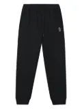 FINGERCROXX logo-patch cuffed joggers - Black