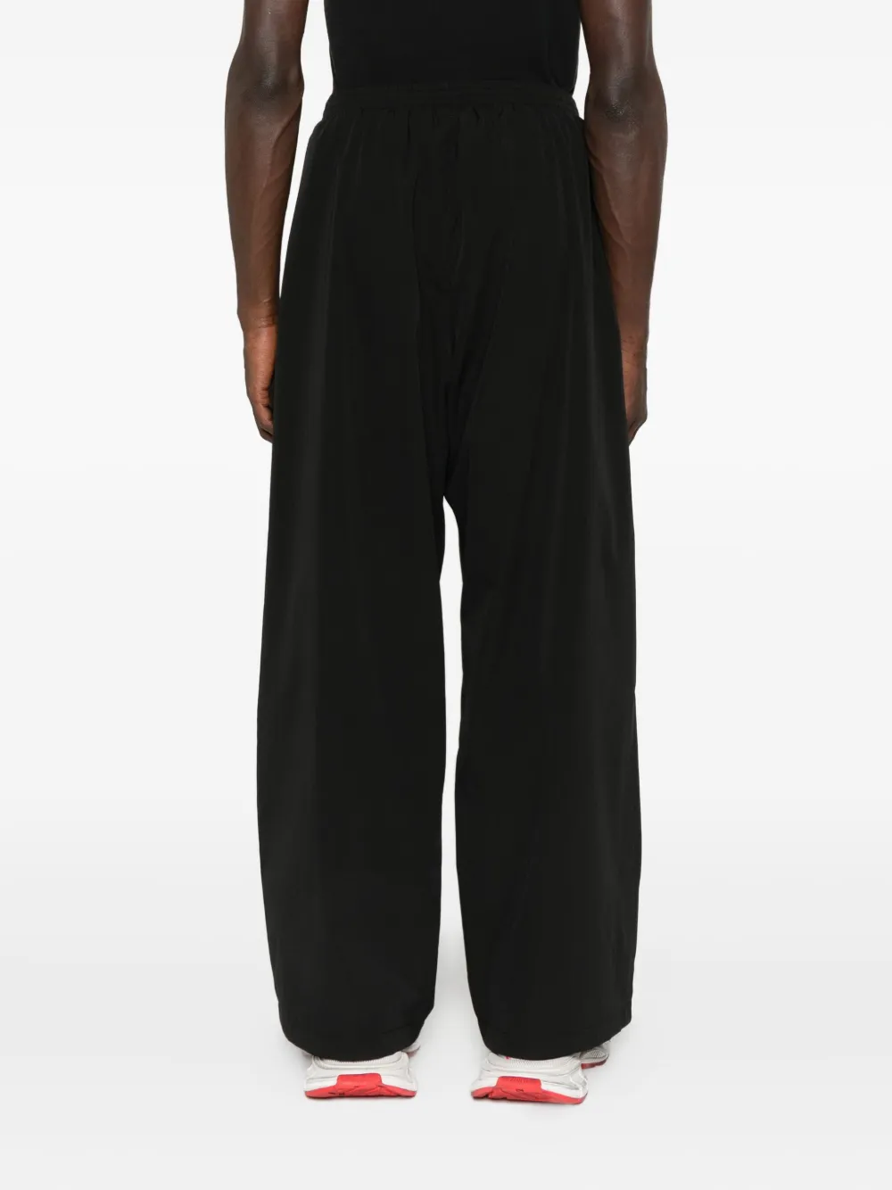 Balenciaga Broek met elastische tailleband en geborduurd logo Zwart