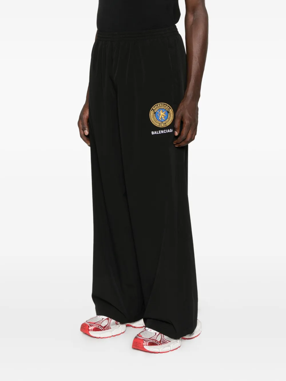 Balenciaga Broek met elastische tailleband en geborduurd logo Zwart