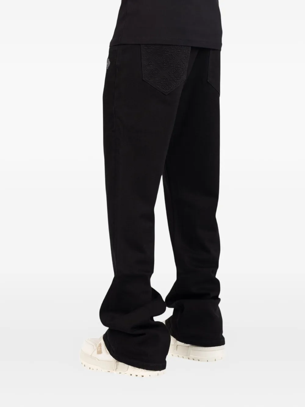 GUAPI logo-embroidered jeans Zwart