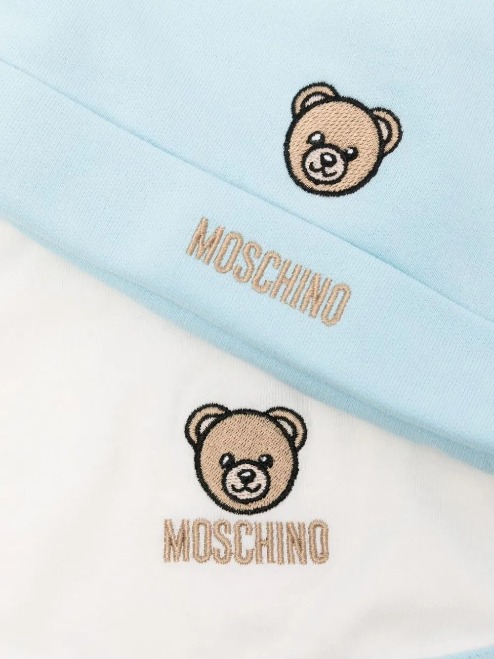 Moschino Kids Muts en slabbetje met geborduurde teddybeer - Blauw