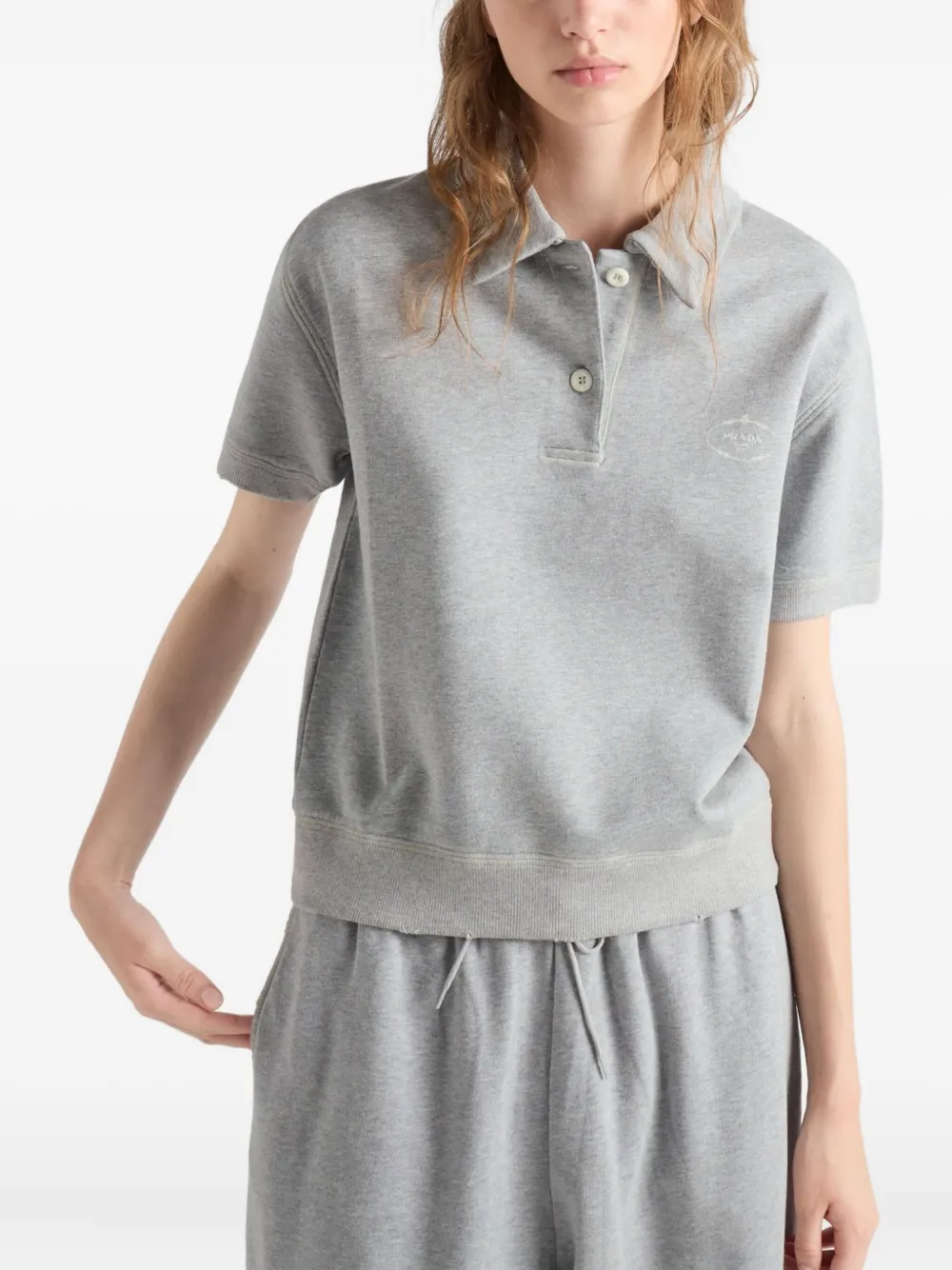Prada logo-embroidered ribbed-knit polo shirt Grijs