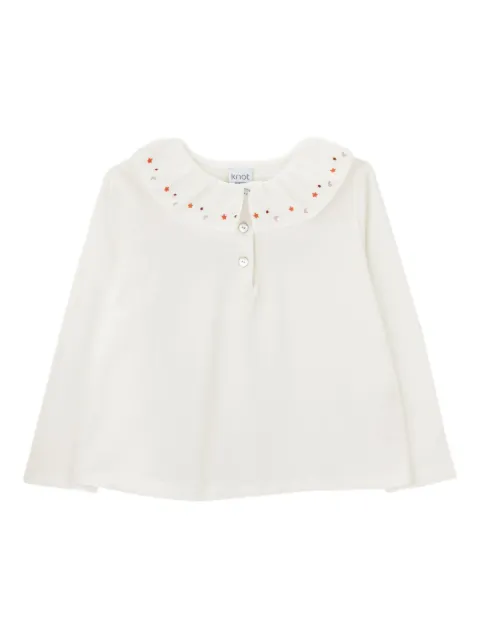 Knot Lilie embroidered ruffled-collar top