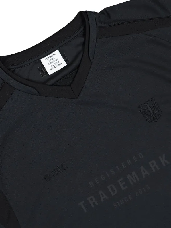 VETEMENTS Trademark Football V-neck Panelled Jersey | Black | FARFETCH