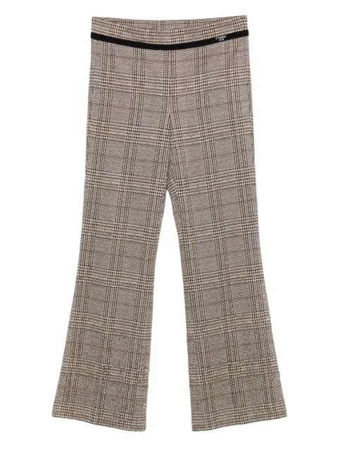 Cambio pantalones con detalles de cuadros
