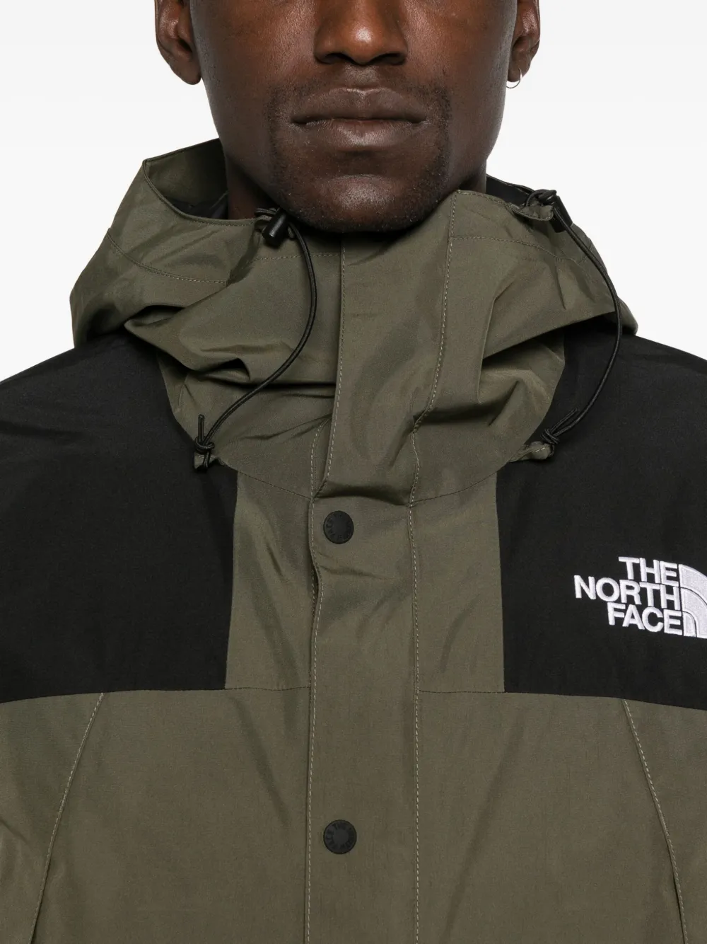 The North Face Mountain Athletics hooded buttoned jacket Groen