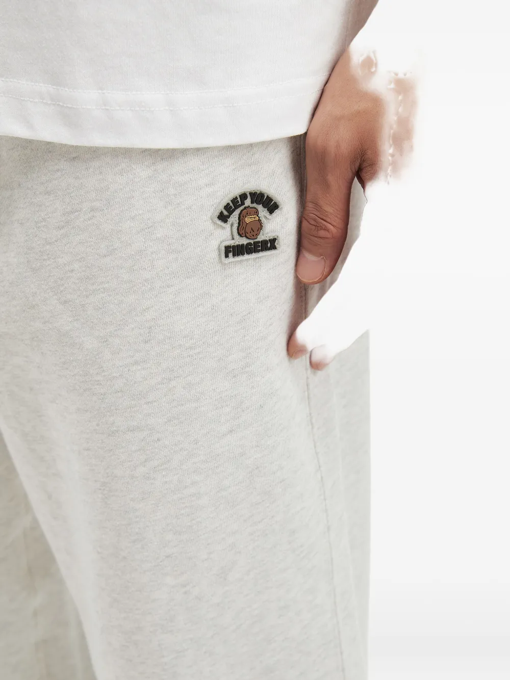 Fingercroxx Logo-patch Cuffed Sweatpants In Gray