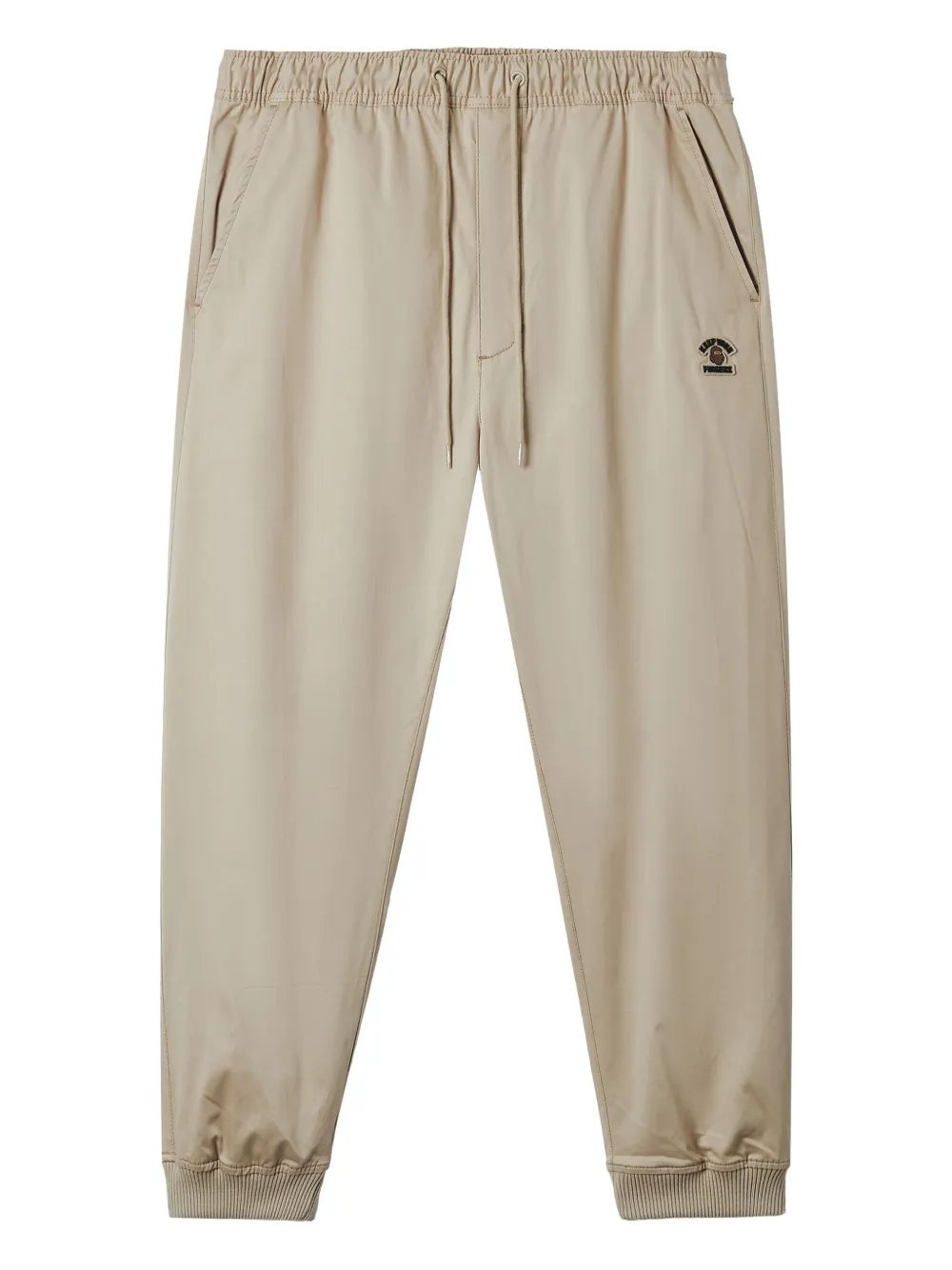FINGERCROXX logo-patch cuffed trousers | Neutrals | Image 1
