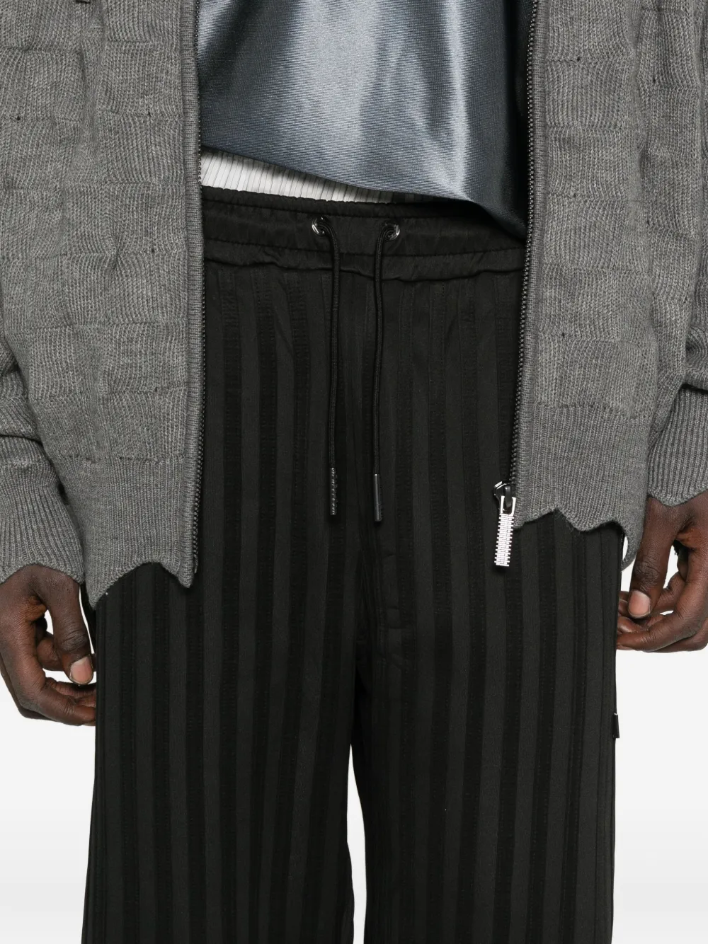 Madfrenzy Striped Zip-pocket Track Pants In Black