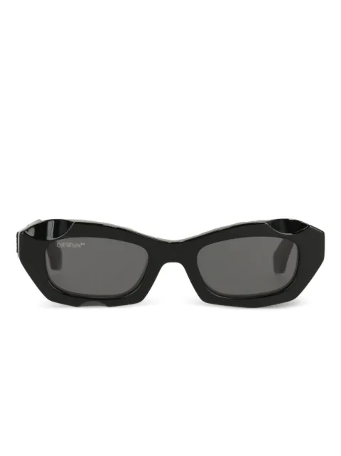 Off-White lentes de sol con armazón ovalada y micas oscuras