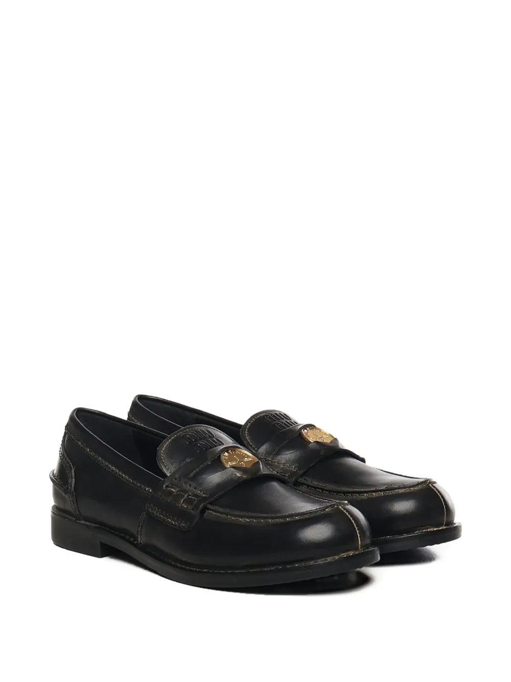 Miu Miu Leren loafers met goudkleurig logo - Zwart