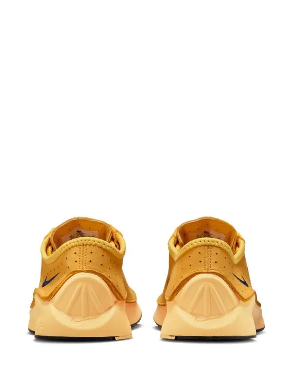 mustard coloured nike trainers