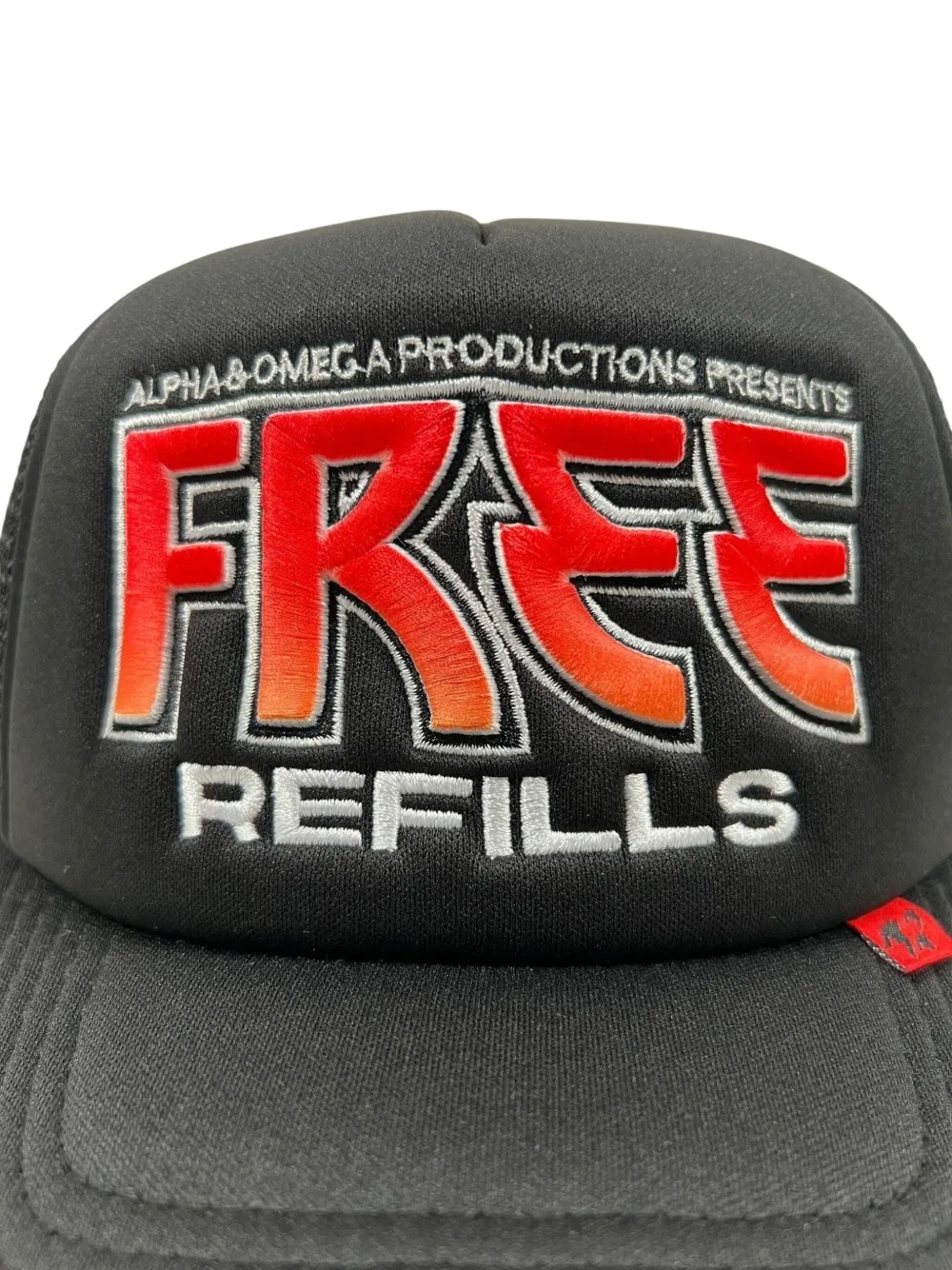 Free Refills Kiss Embroidered Trucker Cap In Black
