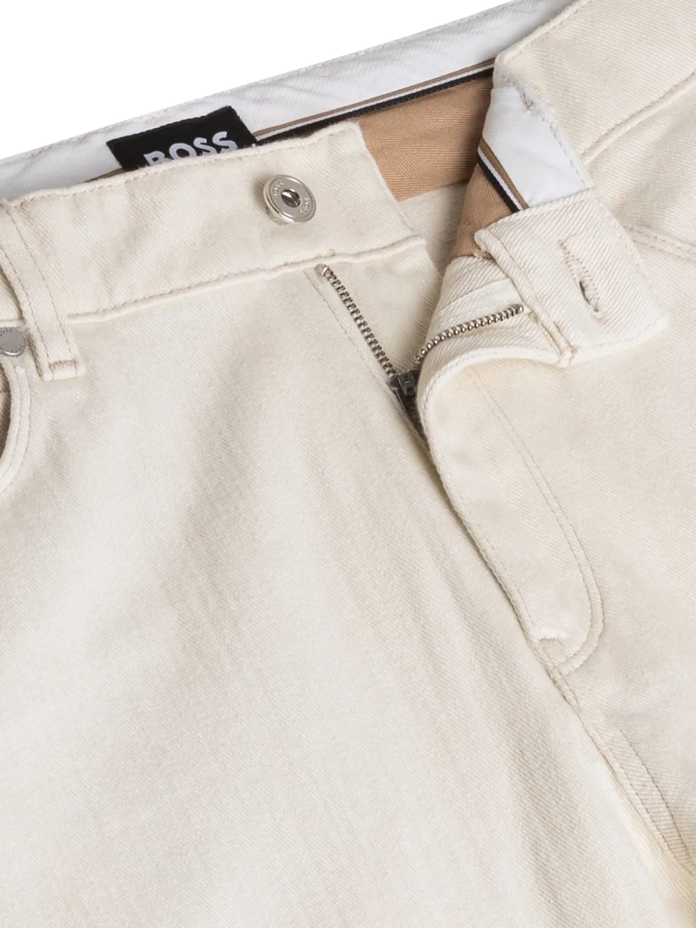 BOSS Geborstelde denim jeans met vijf zakken Beige