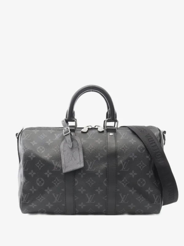 louis vuitton men's black travel bag Empreinte Monogram Giant 1727449 FASHIONPHILE and palladium Keepall Bandoulire 55 Oversized Duffle
