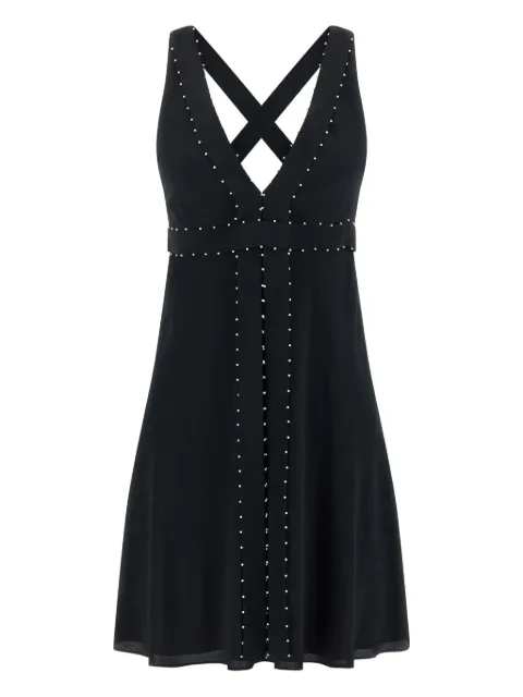 Giovanni Bedin vestido con detalle de perlas