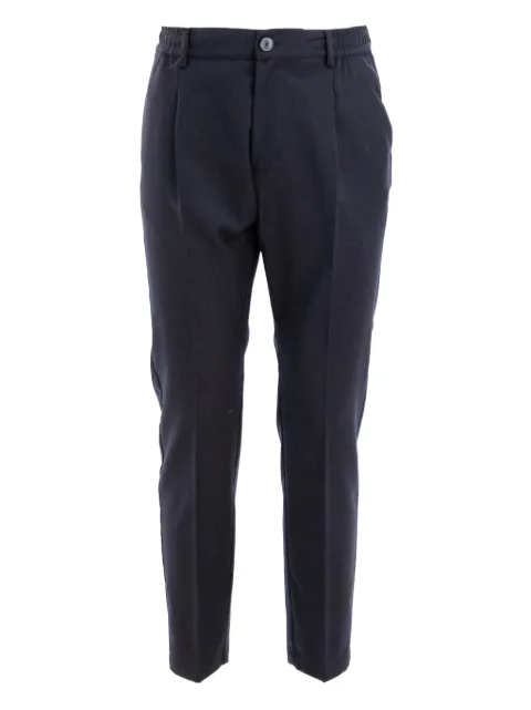 Cruna pleated-front trousers