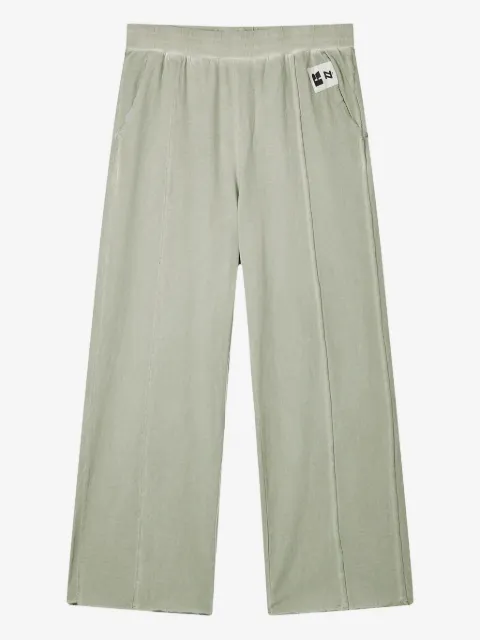 izzue pantalones con bolsillos y detalles deshilachados