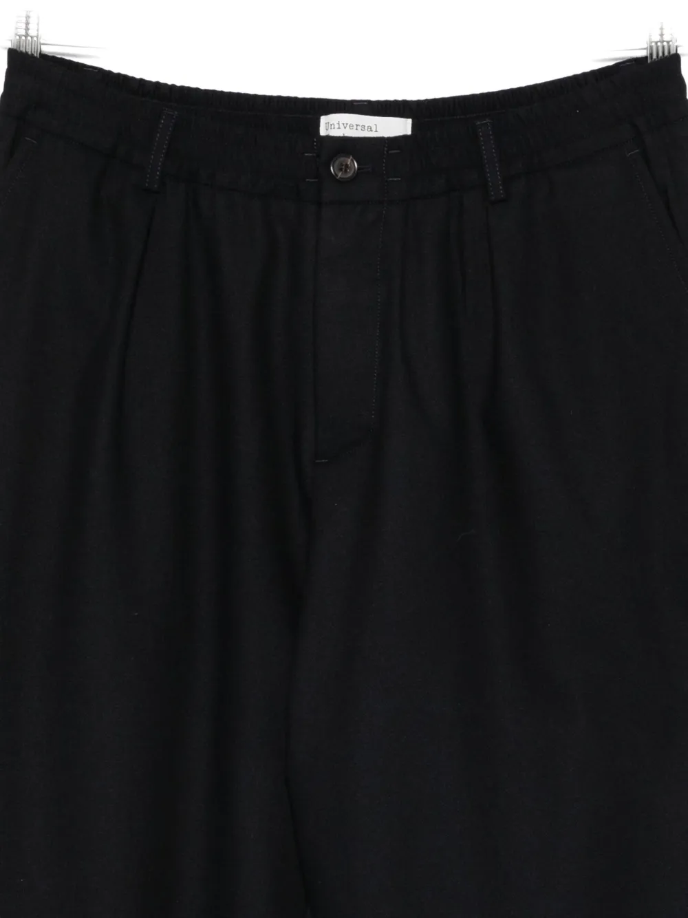 Universal Works Pleated-front Tapered Trousers In Blue