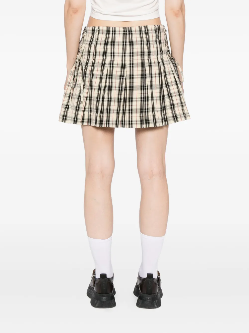 Damson Madder Moffy Plaid Pleated Organic Cotton Miniskirt In Black