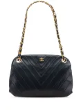 CHANEL Pre-Owned 1989-1991 CC Chevron Quilted Lambskin Kiss Lock shoulder bag - Black