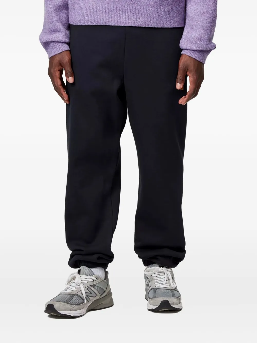 Carhartt WIP logo-detail cuffed track pants - Blauw