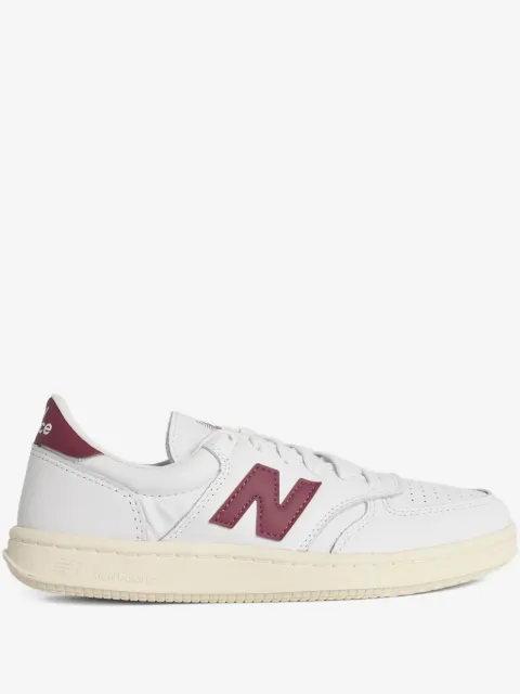 New Balance tenis de piel T500 con parche del logo