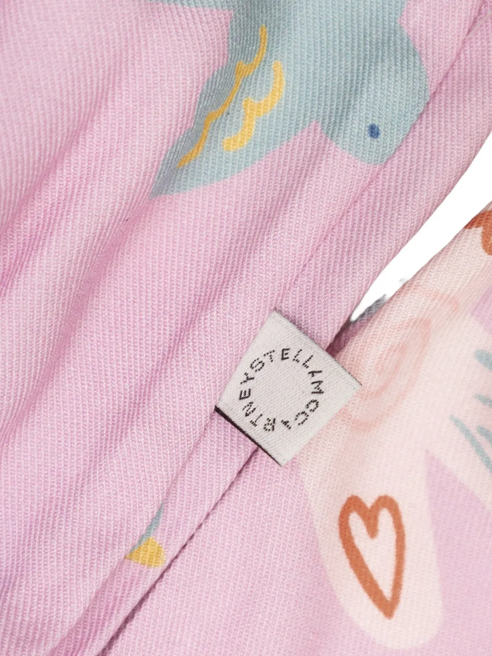 Stella McCartney Kids Gesmockte jurk met print Roze