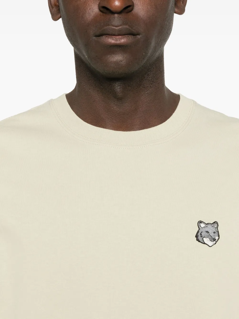 Maison Kitsuné T-shirt met patch Beige