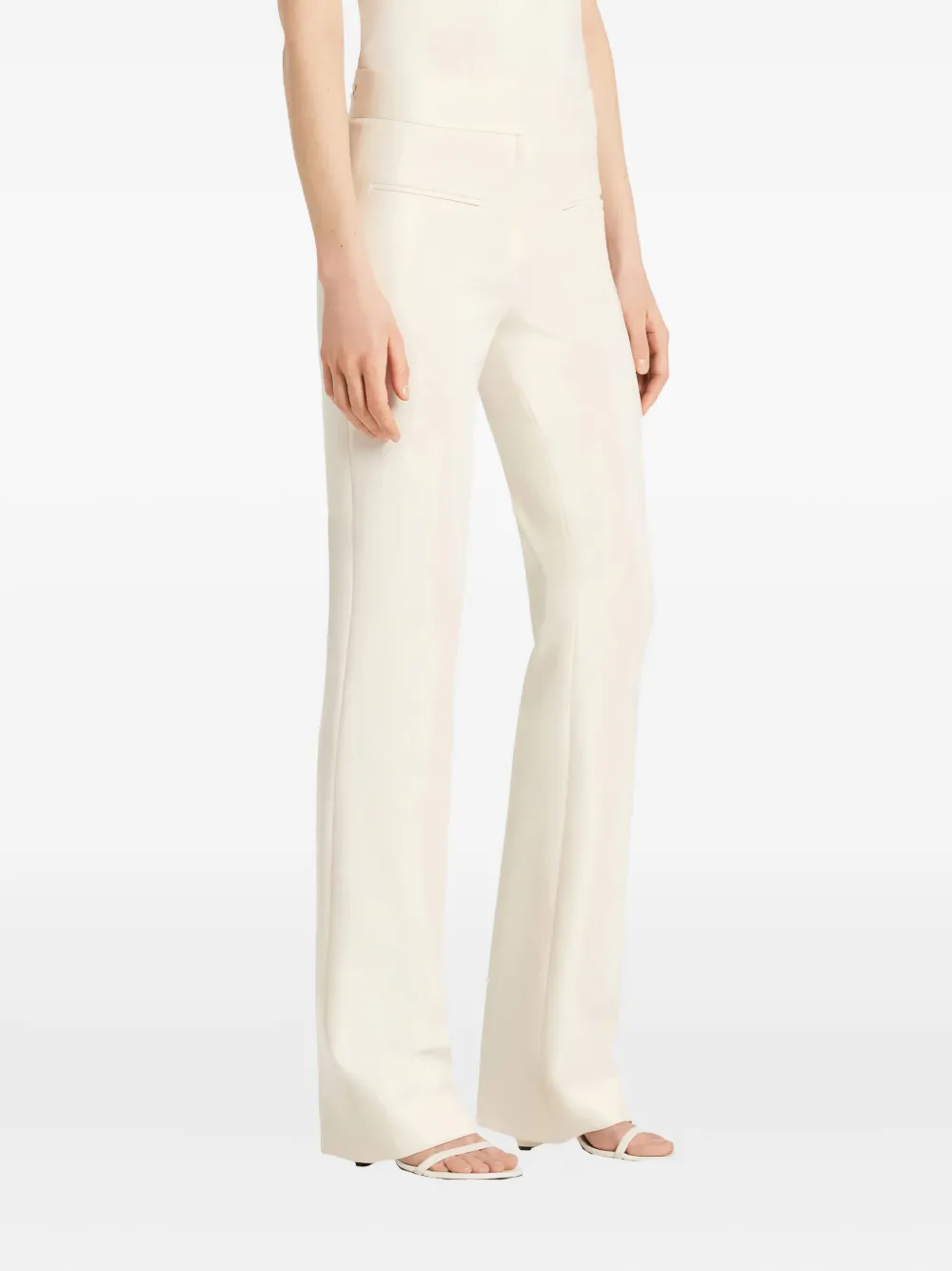 Courrèges welt-pocket bootcut trousers - Beige