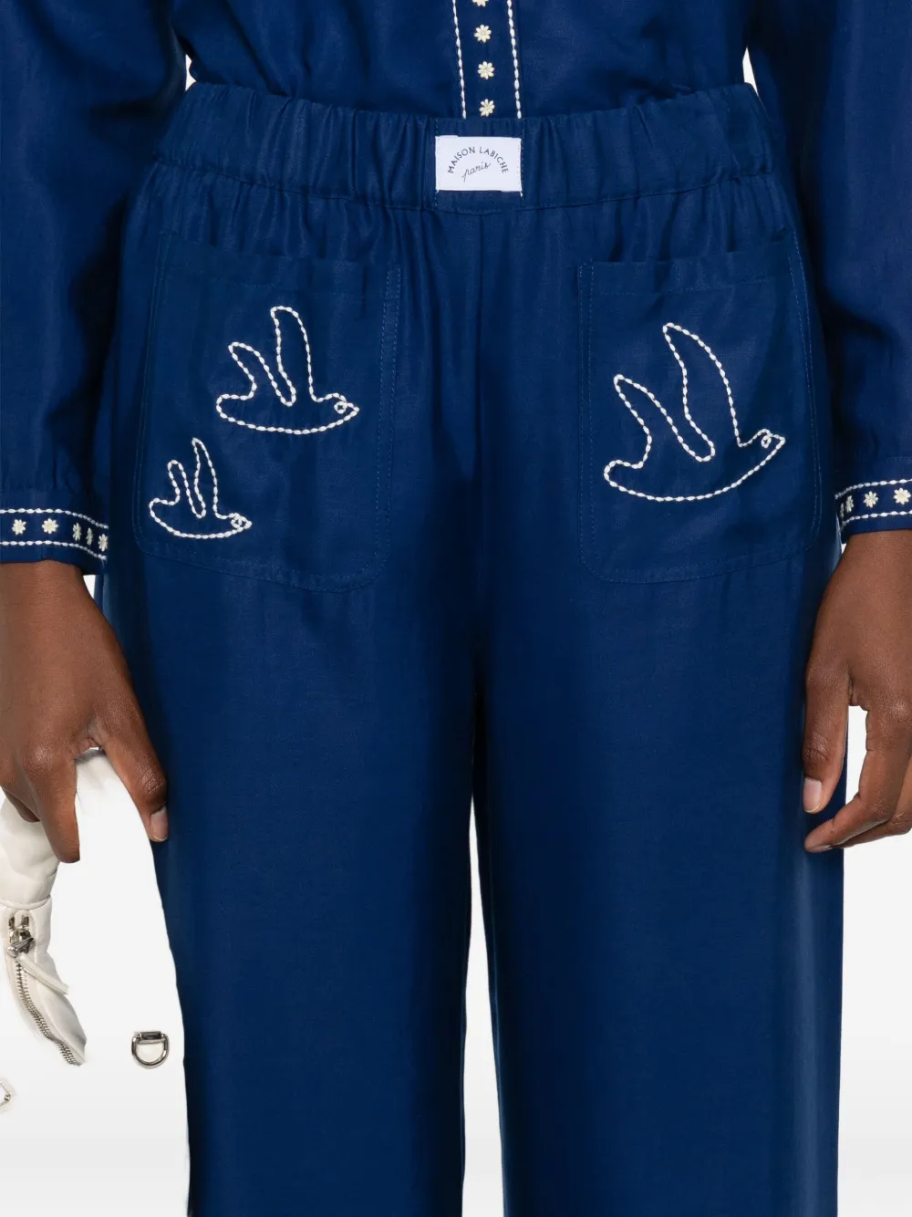 Maison Labiche Bird-embroidered Trousers In Blue