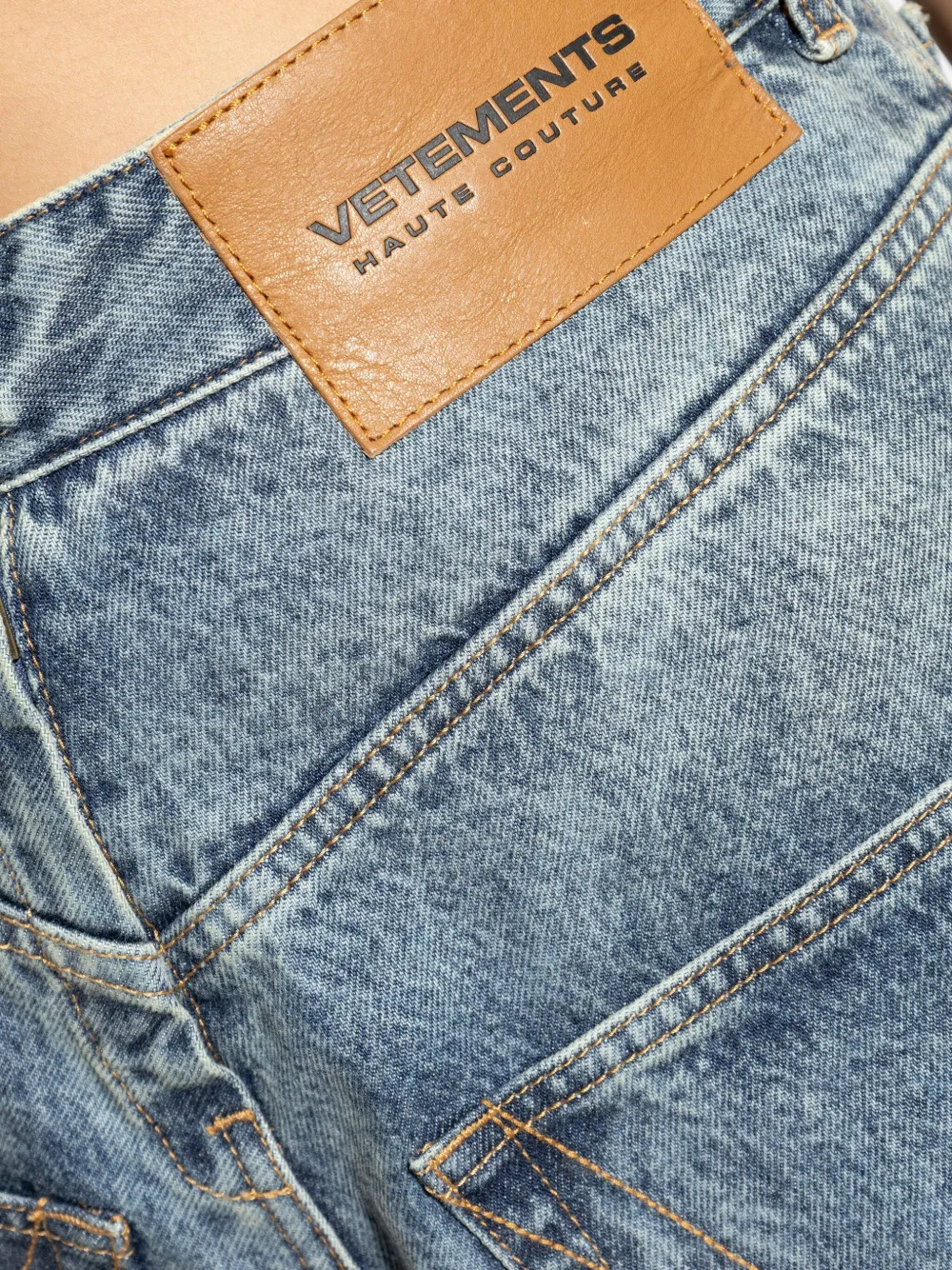 VETEMENTS Gerafelde jeans met V-detail Blauw