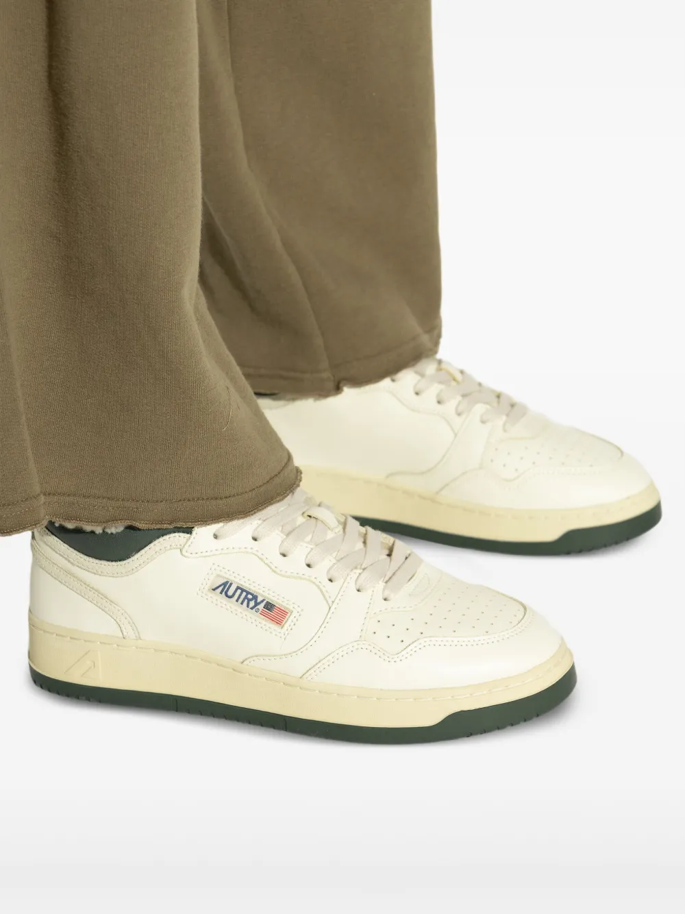 Autry Shearling-lined Leather Sneakers In White
