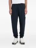 Stone Island cuffed logo-patch tack pants - Blue