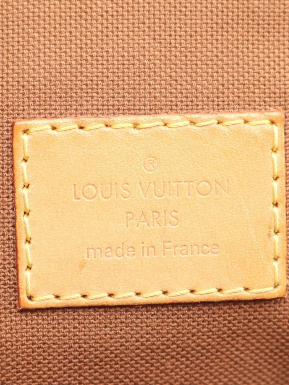 Pre-owned Louis Vuitton 2011 Monogram Tivoli Gm Handbag In Brown