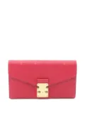 Louis Vuitton Pre-Owned 2019 monogram-embossed clasp wallet - Red